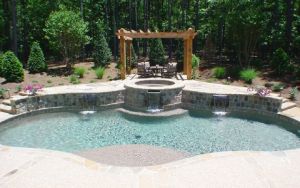 Custom backyard pool designs in Metro Atlanta with modern landscaping and outdoor living upgrades